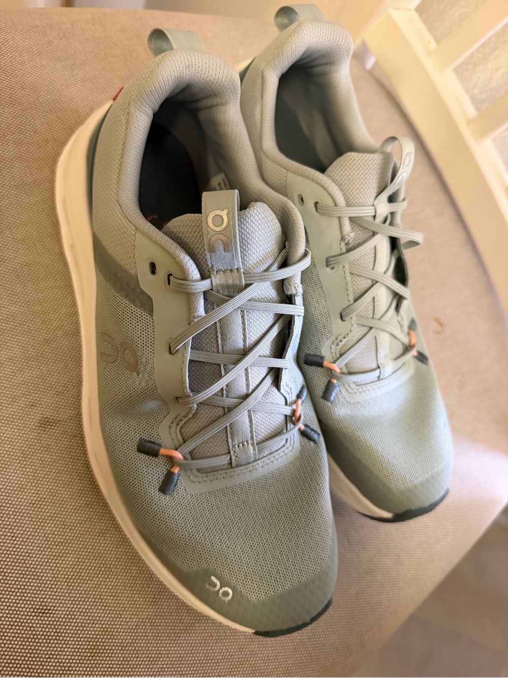 On Running kid’s Athletic Sneakers in Sage Green and White